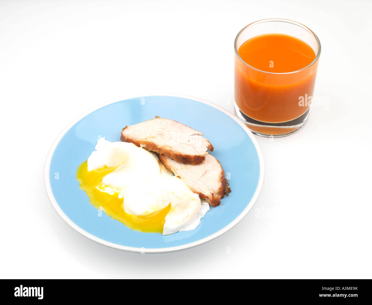 La Turchia con le uova in camicia e succo di carota Foto Stock