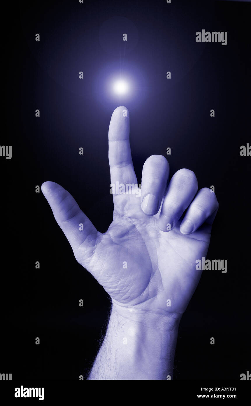 Mano con punto di tecnologia della luce idea concept Foto Stock