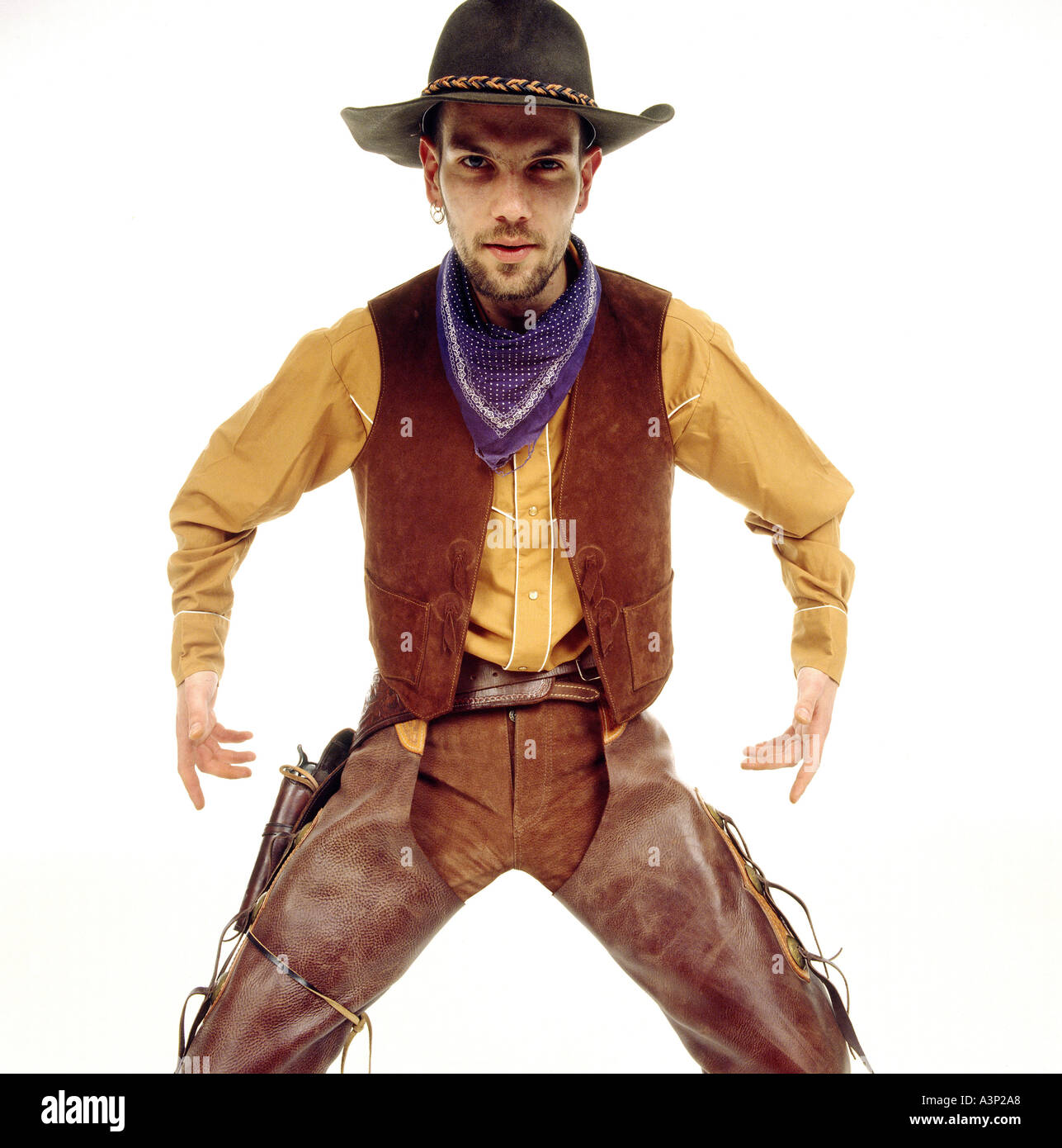 Giovane uomo vestito da cowboy, ritratto Foto Stock
