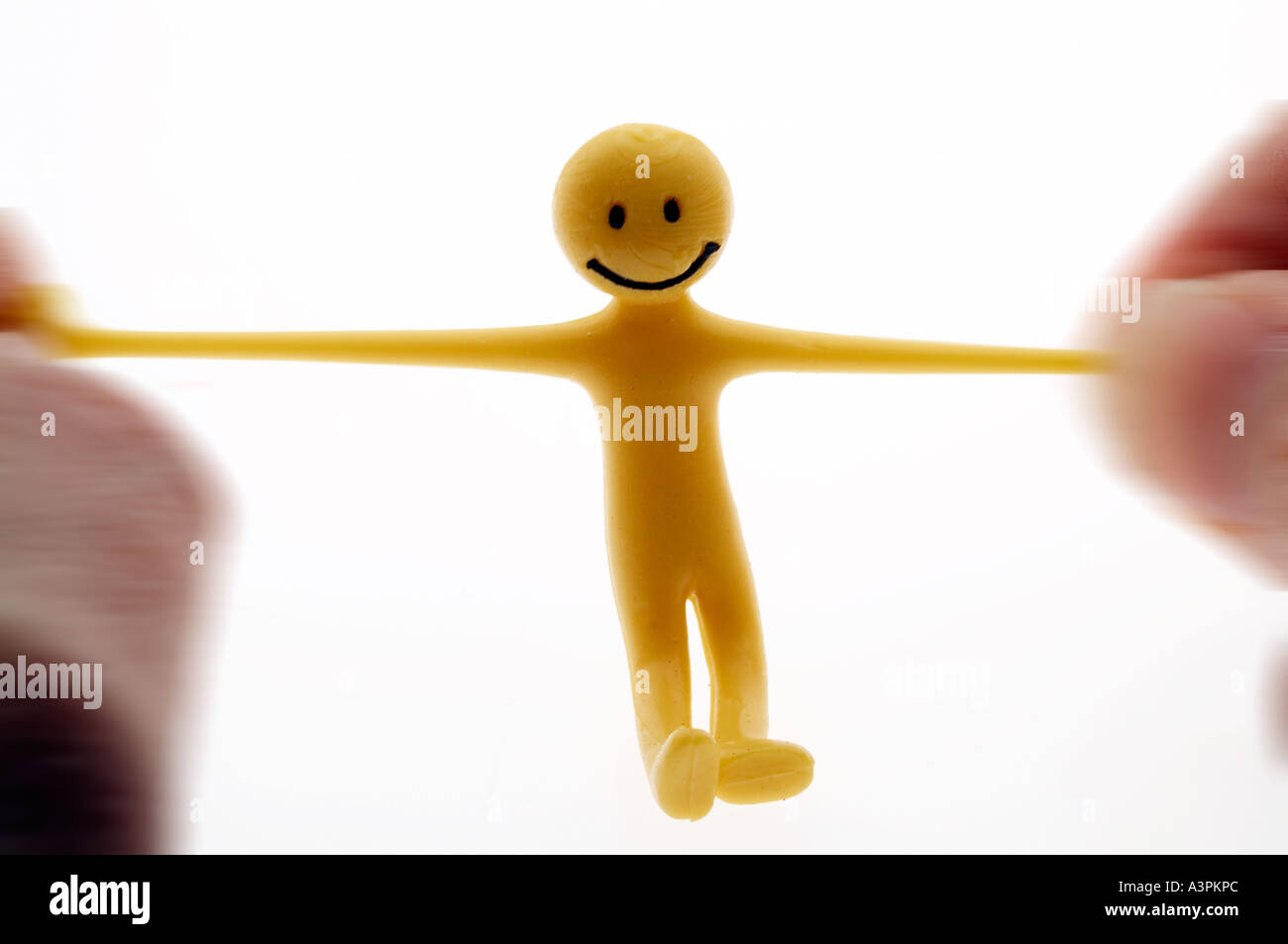 Piccolo uomo, Smiley face, bendy, sorridente uomo giallo Foto Stock