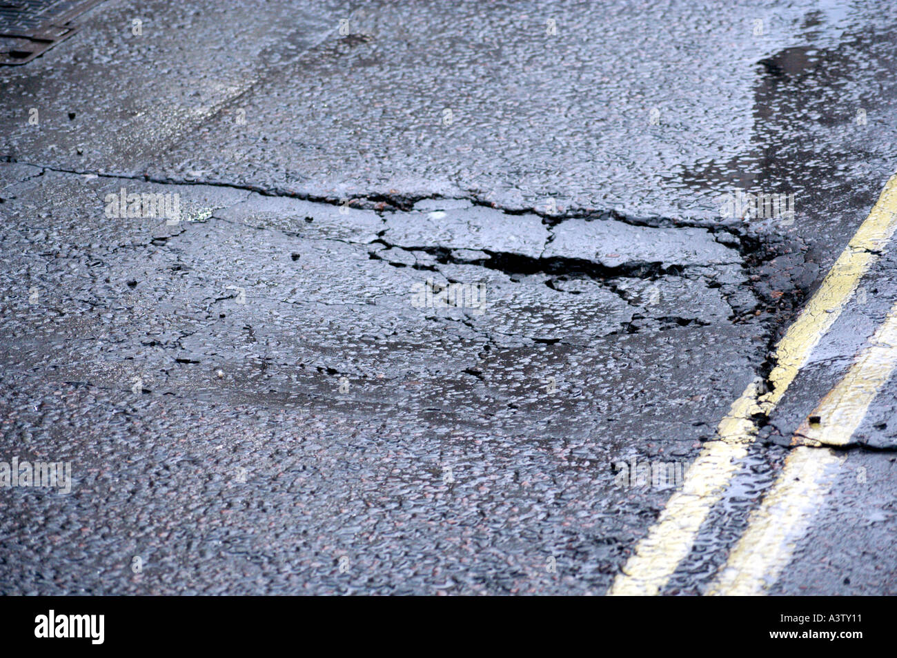 Cracking Road Foto Stock