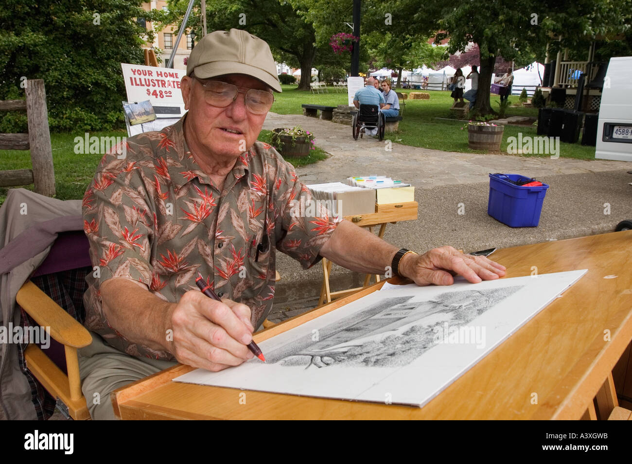 Artista con penna e inchiostro per creare un disegno Corydon Indiana Foto Stock