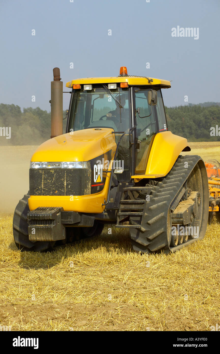 La Caterpillar Tractor e erpice a dischi Foto Stock