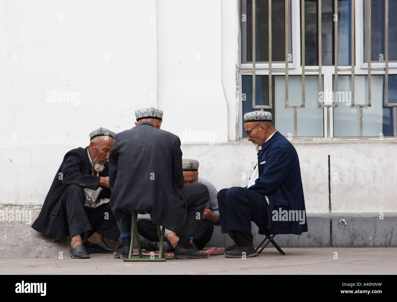 Uighur uomini carte da gioco Foto Stock