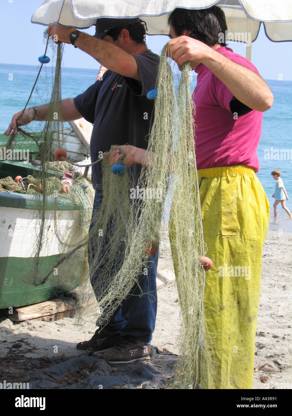 I pescatori della costa del sol Foto Stock