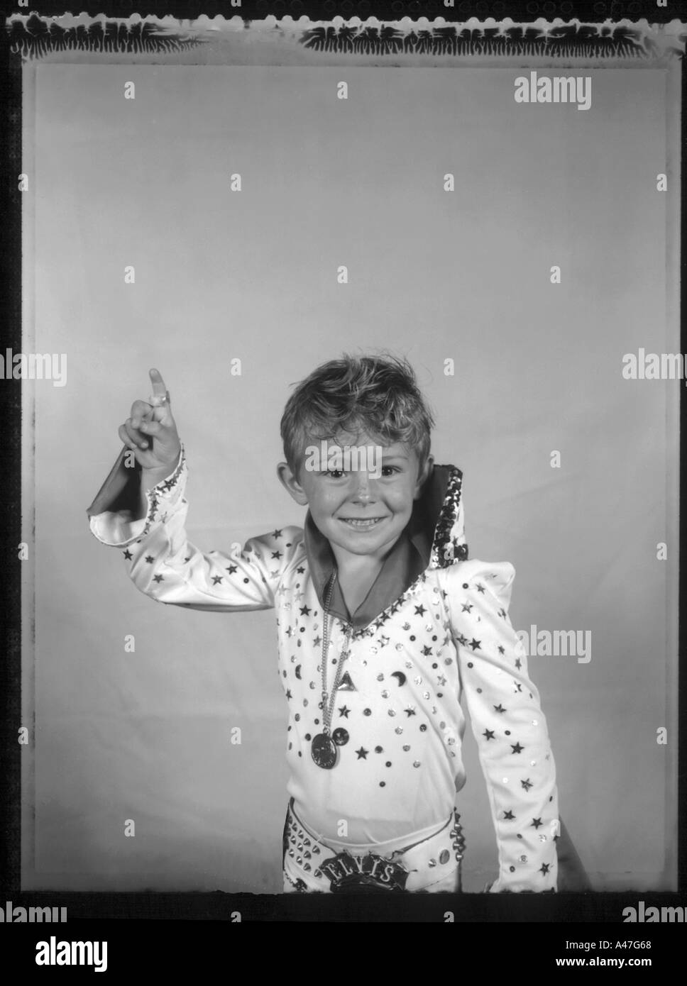 Kid. Un ragazzo fan di Elvis in una convenzione di Elvis a Blackpool Regno Unito Foto Stock