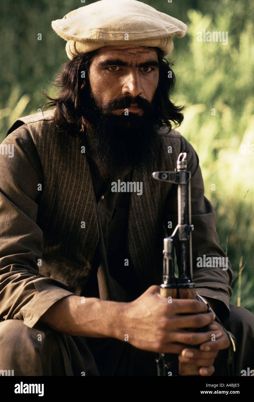 Logar, a sud di Kabul, Afghanistan, agosto 1992; Mujahideen fedeli a Gulbuddin Hekmatyar, il capo di Hezb-e Islami, alla loro base a Logar, a sud di Kabul. Foto Stock