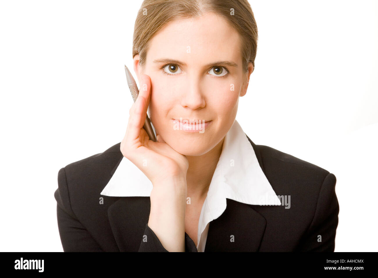 Junge lächelt Geschäftsfrau mit ihrem Gesicht auf der mano modello abgestützt Anja Théry Foto Stock
