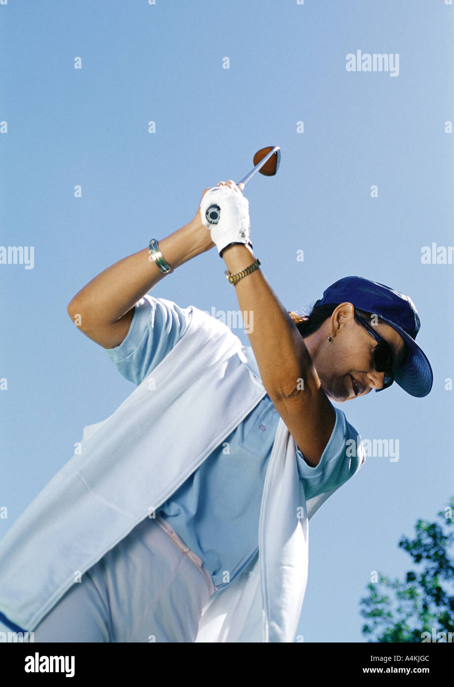 Coppia golfista swinging Foto Stock