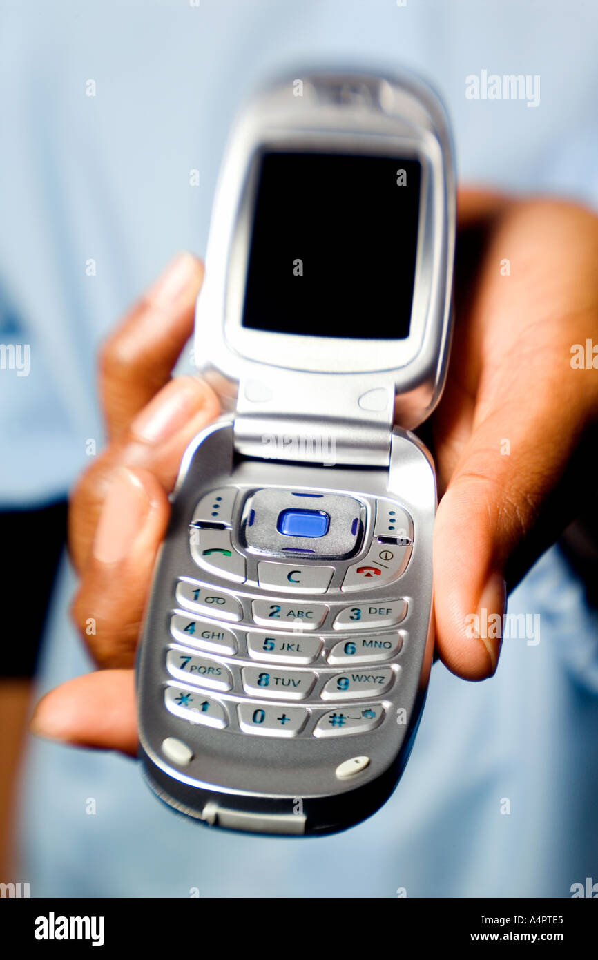 Mano Azienda Mobile Cellulare Foto Stock