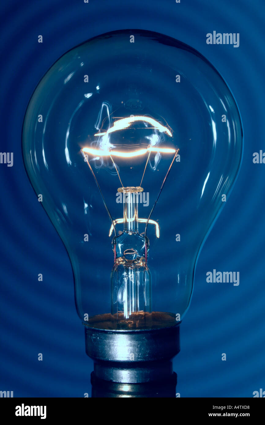 La lampadina della spia e onde azzurre Foto Stock
