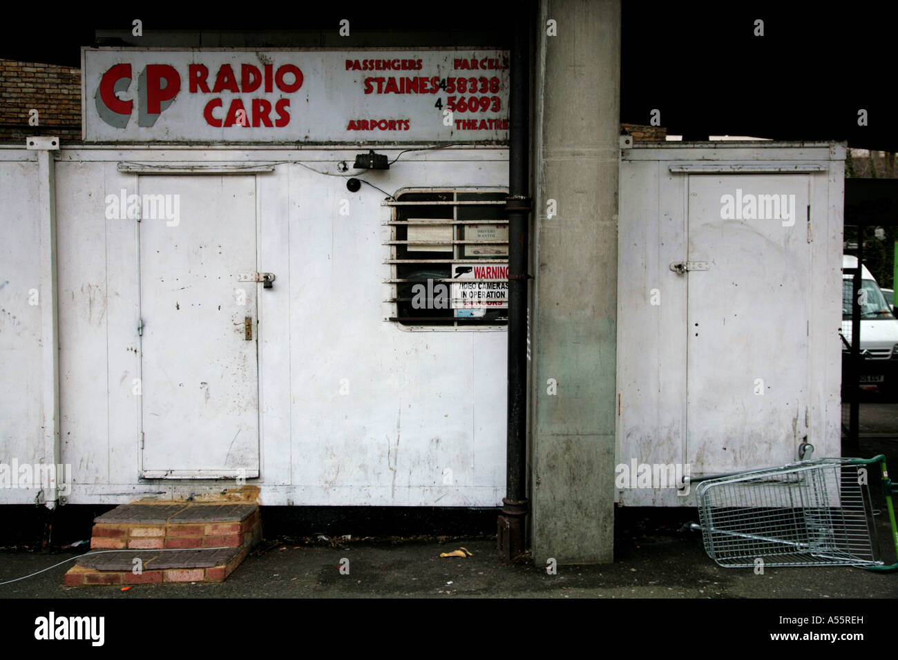Eseguire-down ditta minicab office Foto Stock