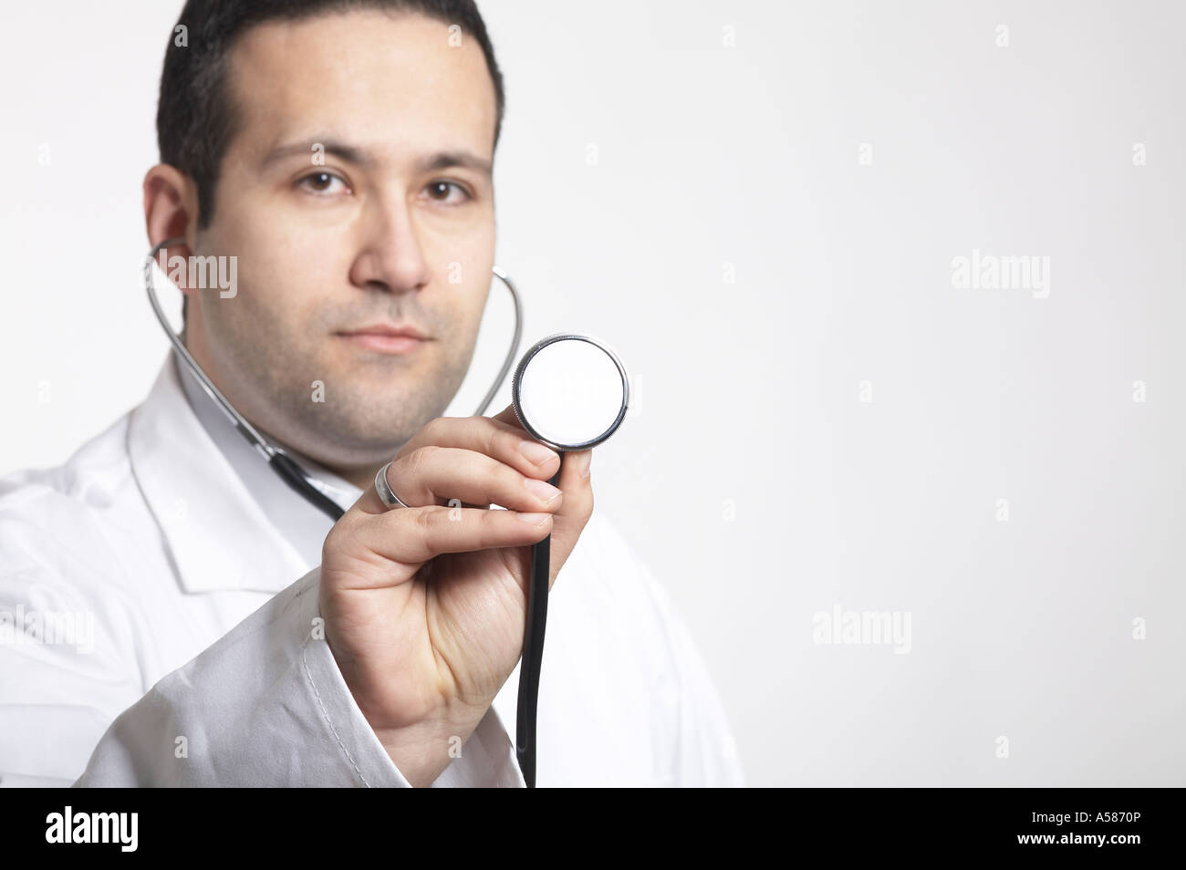 Medico con stetoscopio Foto Stock
