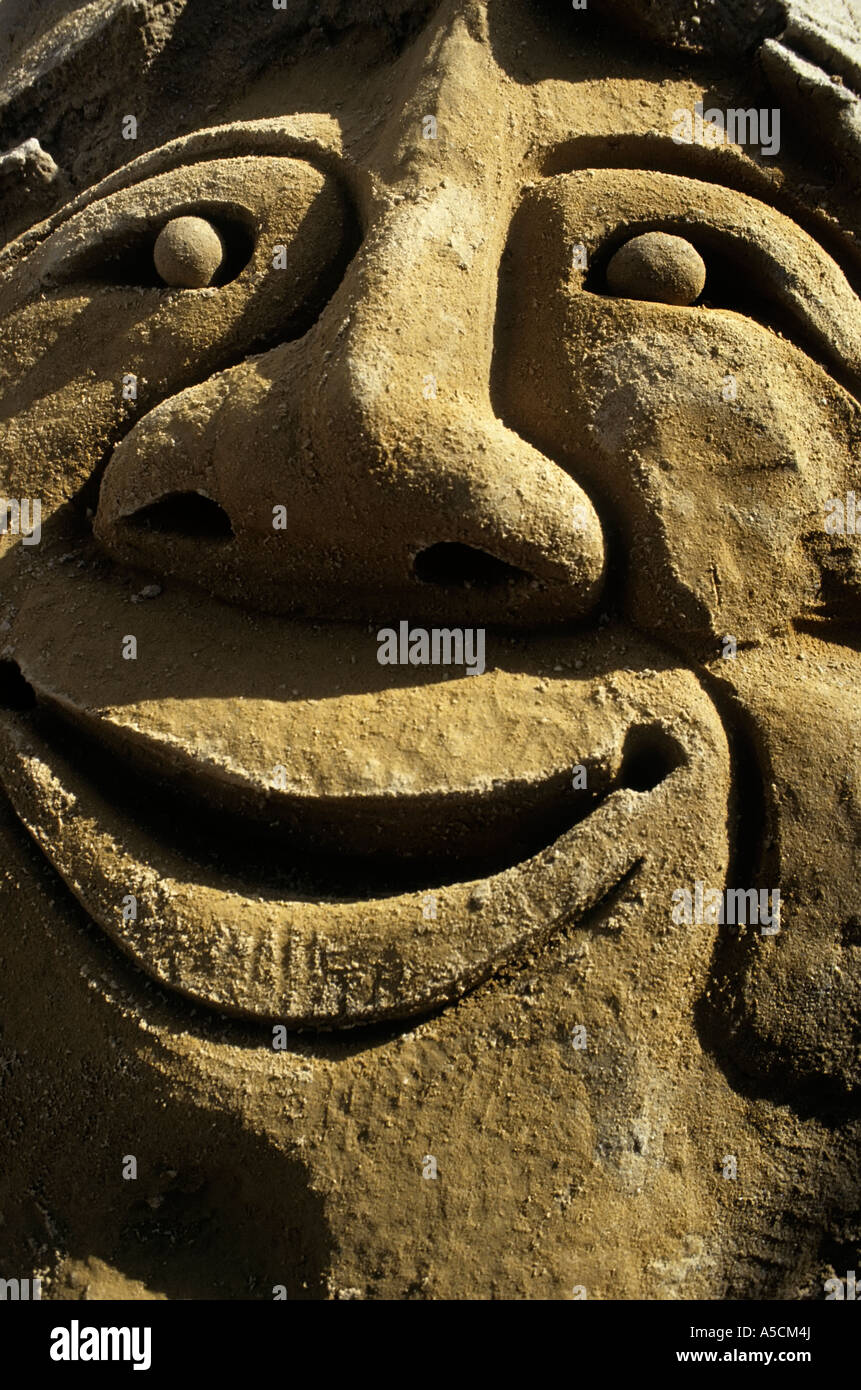 La faccina sorridente ornamento scolpiti in pietra di Madrid Spagna Foto Stock