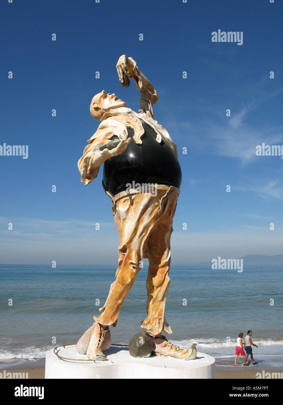 Statua di uomo mangiare oyster su El Malecon lungomare di Puerto Vallarta, Messico Foto Stock