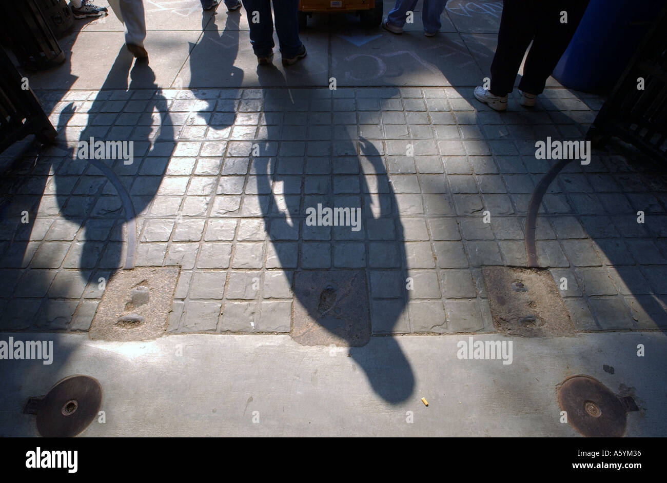 Ombre di persone Foto Stock