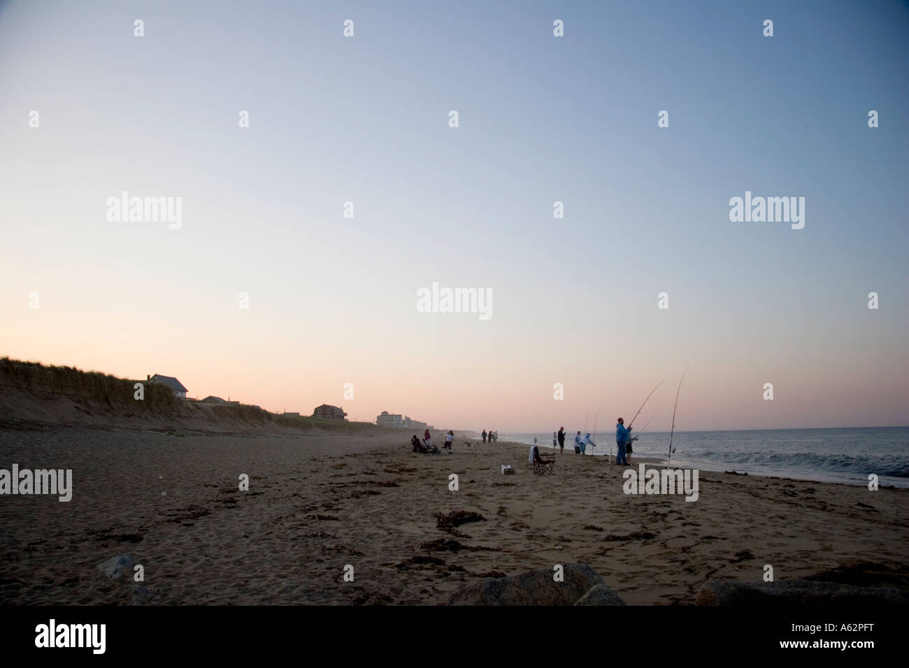 Tramonto a Newburyport Massachusetts USA la pesca in spiaggia a riva surfcasting Plumb Island Foto Stock