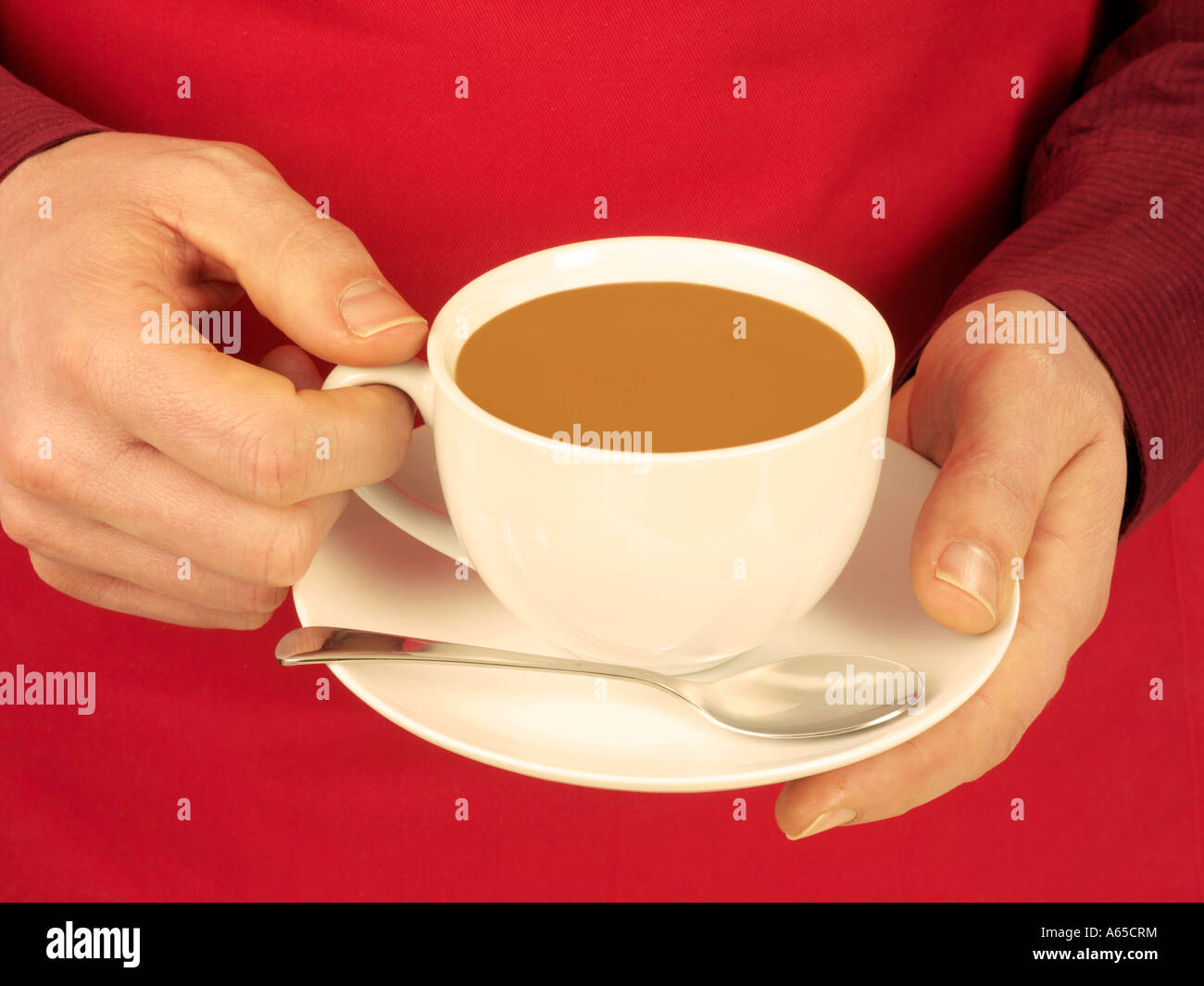 Uomo con tazza di caffè con latte Foto Stock