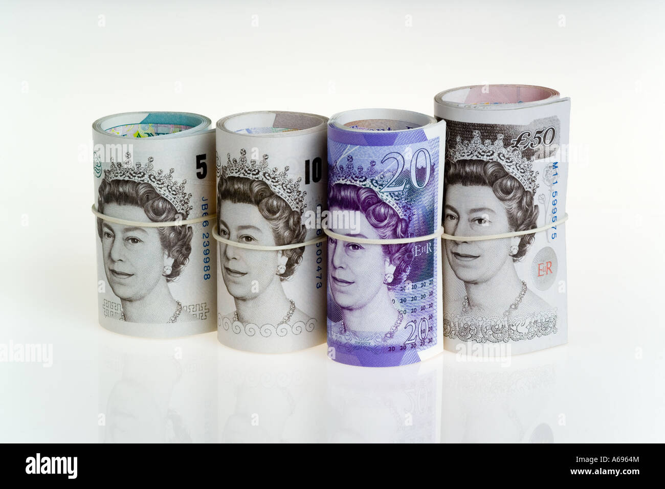 Rotoli di £ 5 £10, £20, £50 British banconote Foto Stock