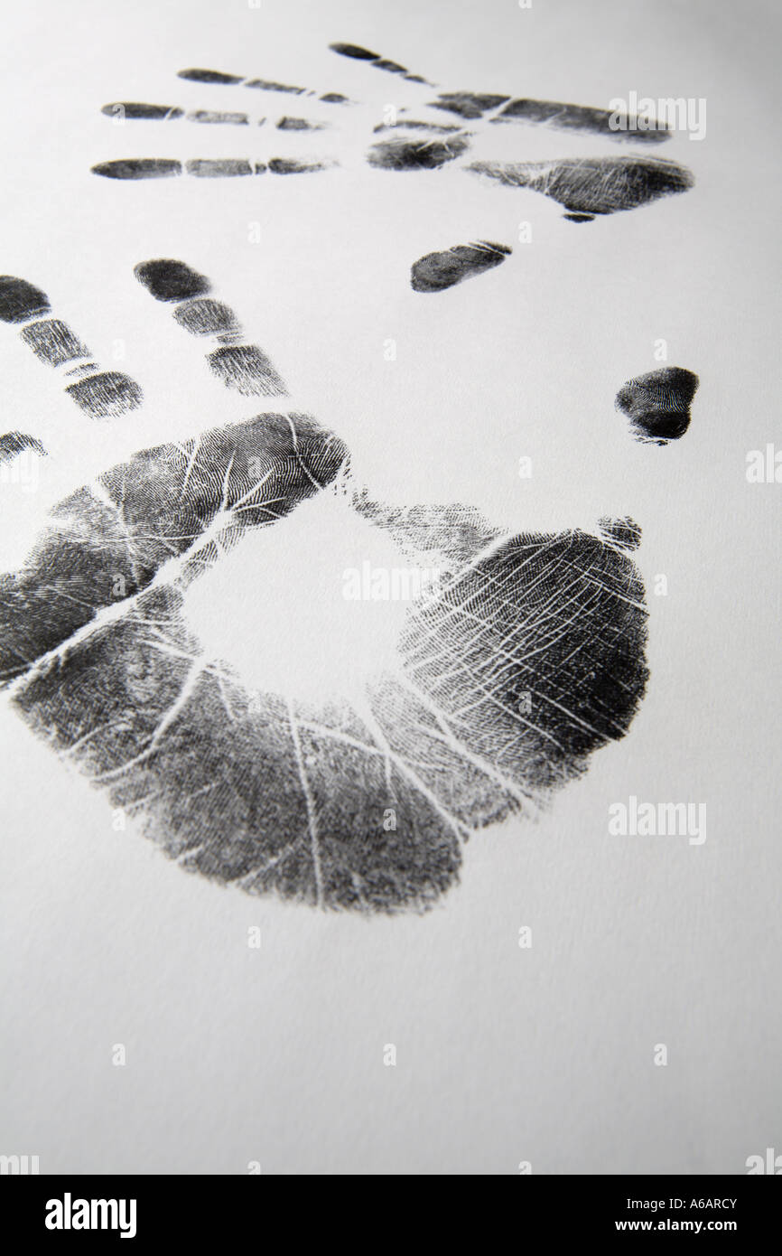 Due handprints su un bianco di massa posteriore Foto Stock