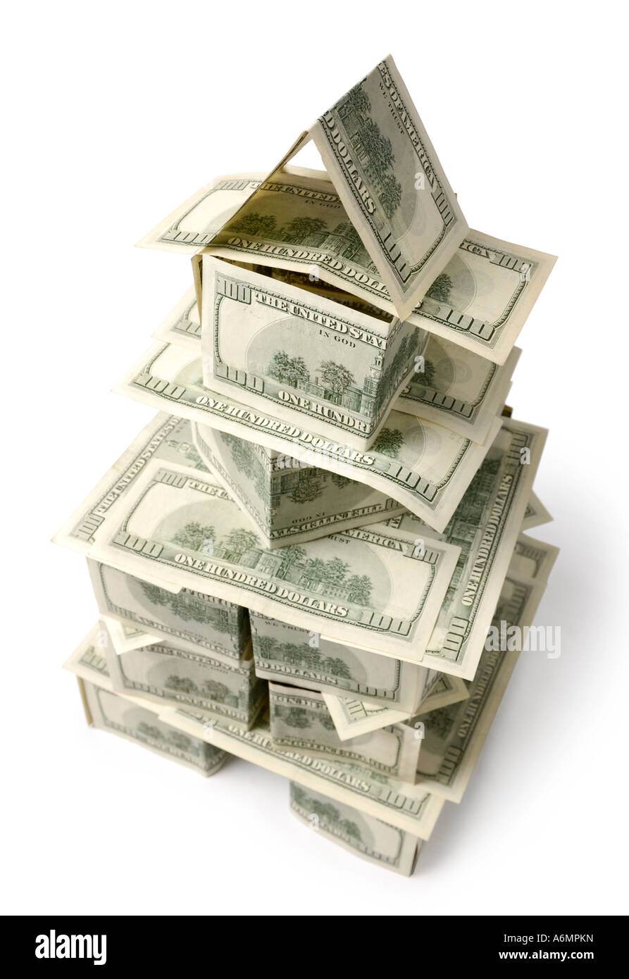 Torre realizzata da Dollar Bills alloggiamento investimento immobiliare affitto concetto di ipoteca Foto Stock