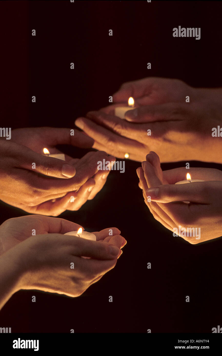 Le candeline in mani cave Foto Stock
