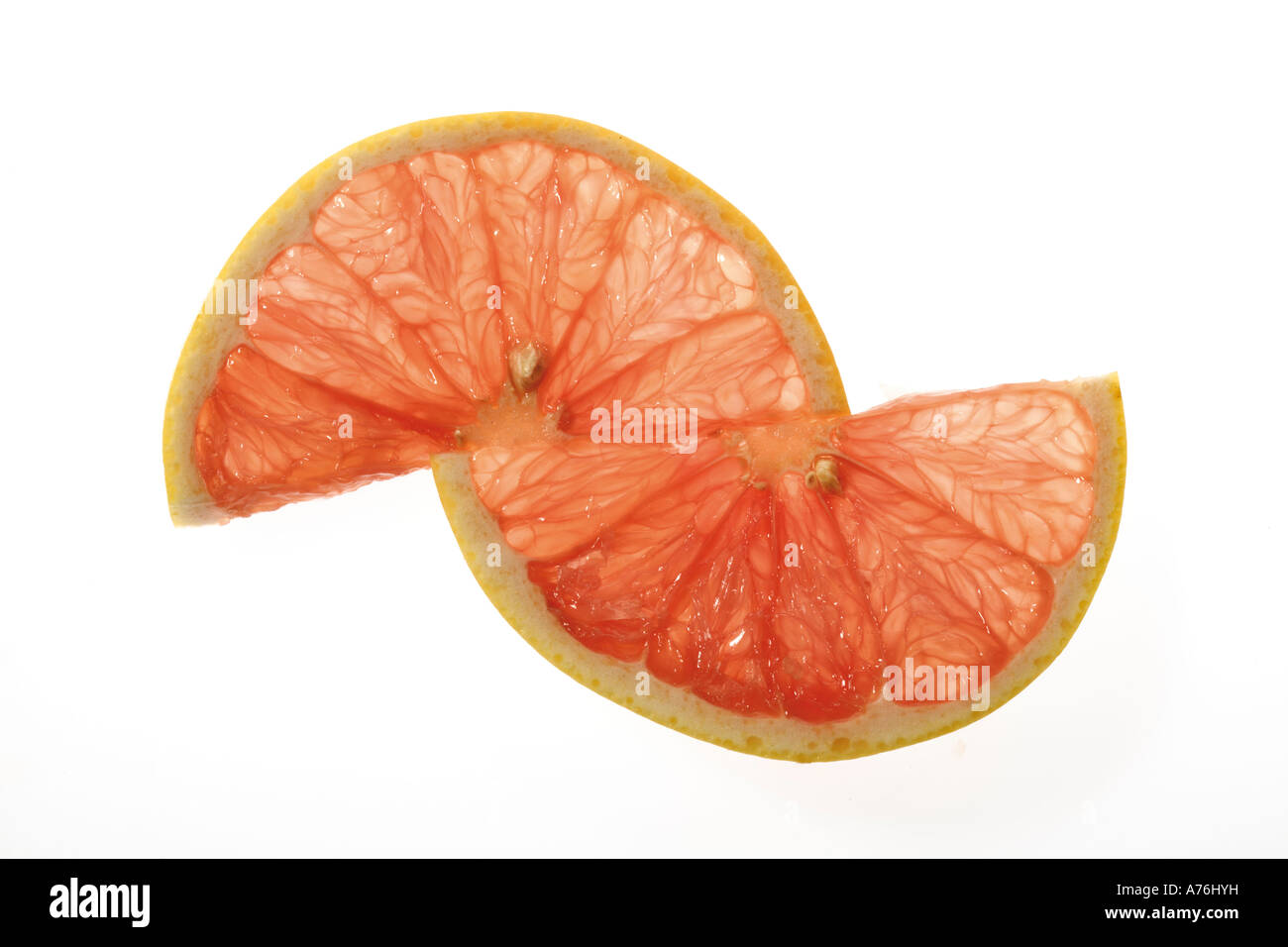 Due fette di pompelmo rosso rubino Foto Stock