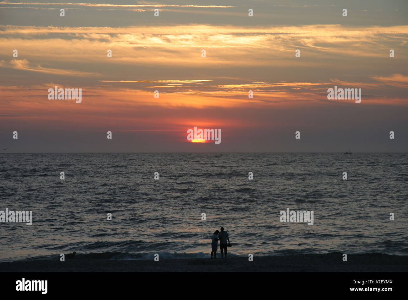 Un paio di orologi tramonto sulla spiaggia di Sylt, Schleswig-Holstein, Germania Foto Stock