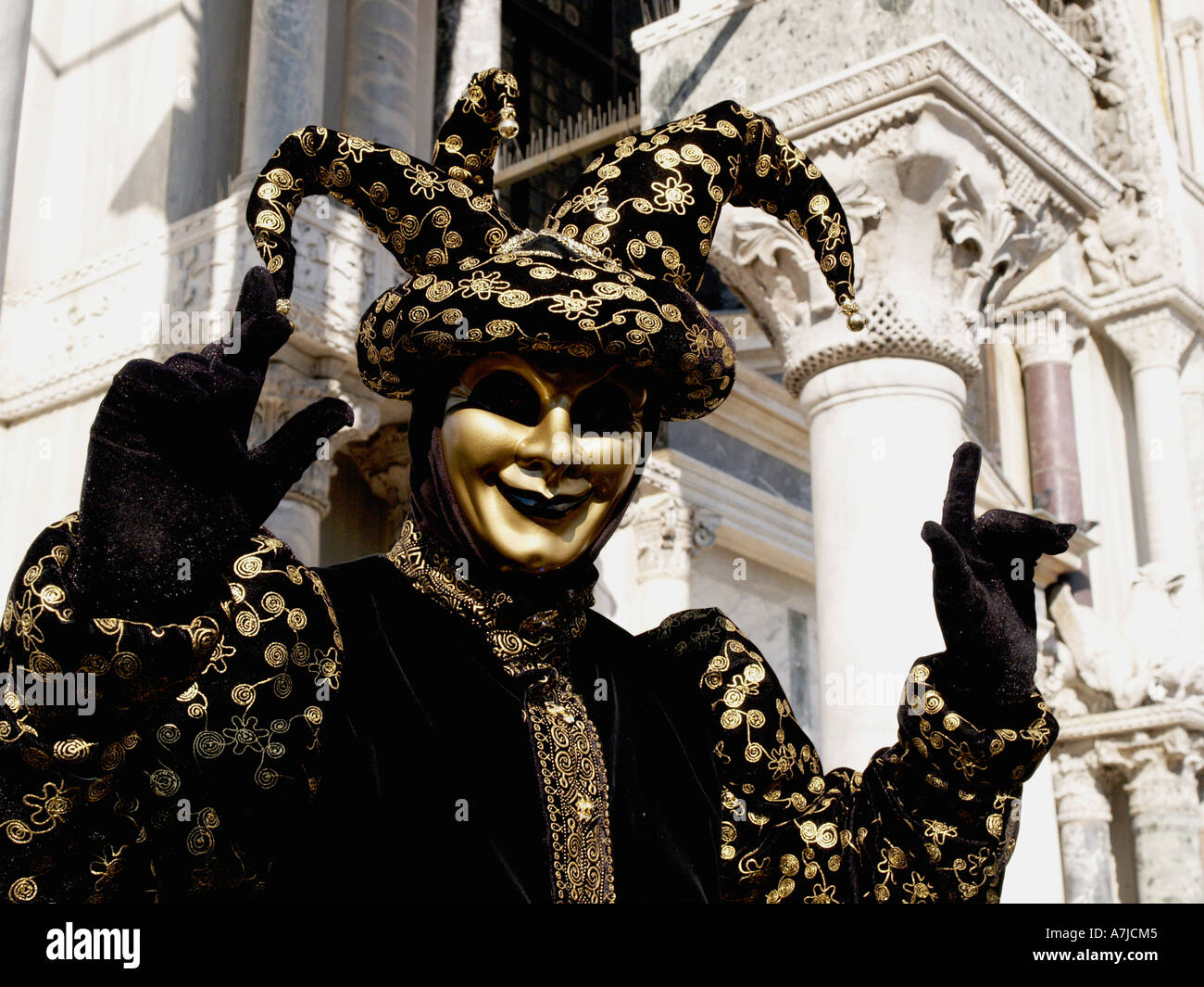 Oro nero jester costume di carnevale di Venezia Foto Stock