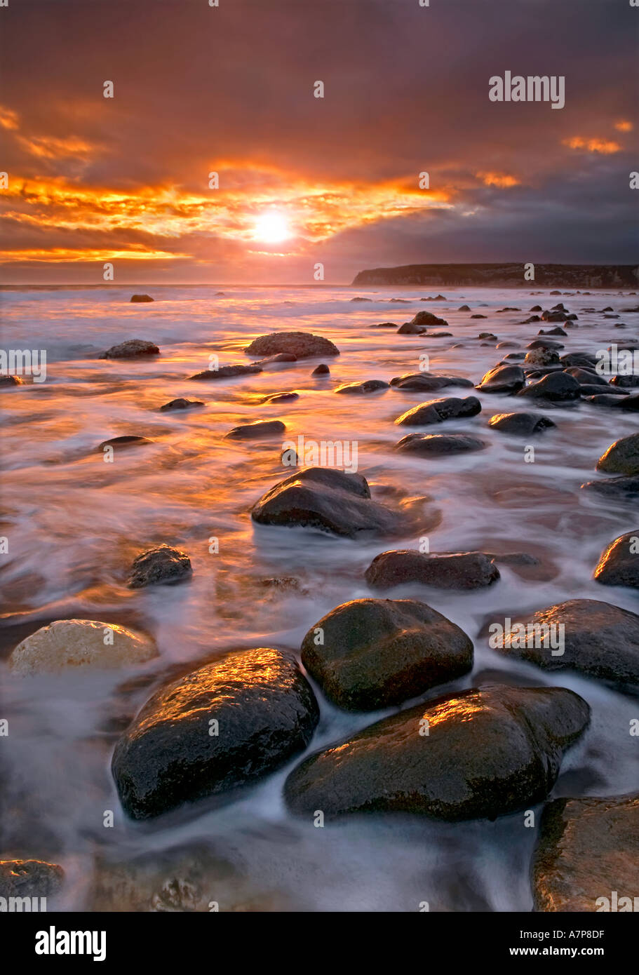 Seaton Bay al tramonto Devon England Foto Stock