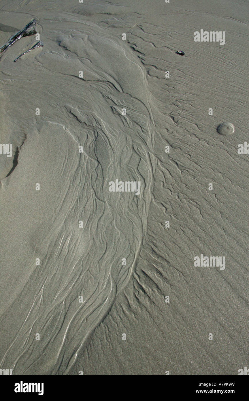 Ripples in spiaggia di sabbia a sinistra da onde sfuggente Port Nolloth Northern Cape Sud Africa Foto Stock