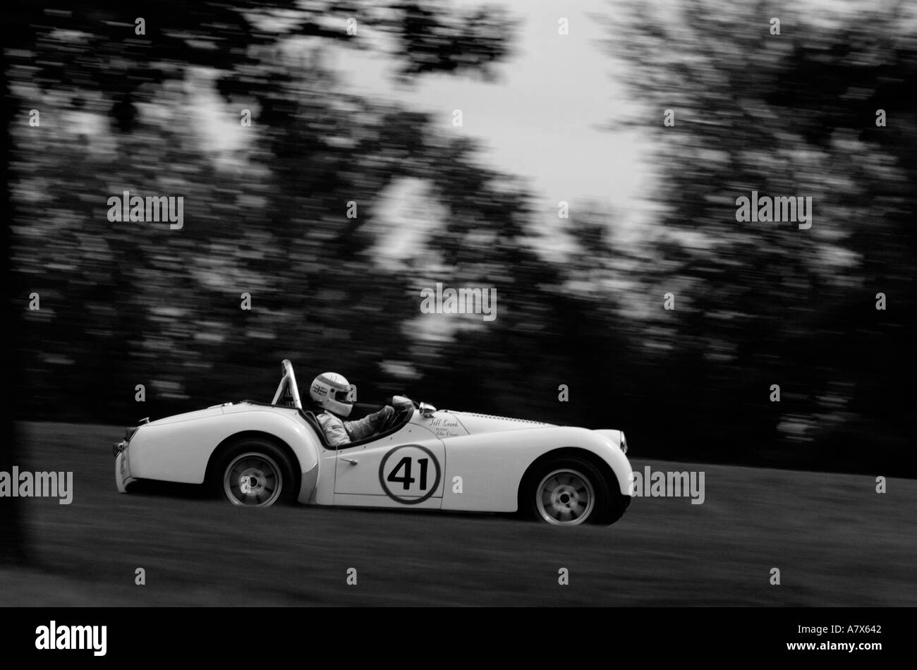 Jeff Snook gare il suo trionfo 1961 TR3A al Vintage Grand Prix au Grattan XVIII 2004 Foto Stock