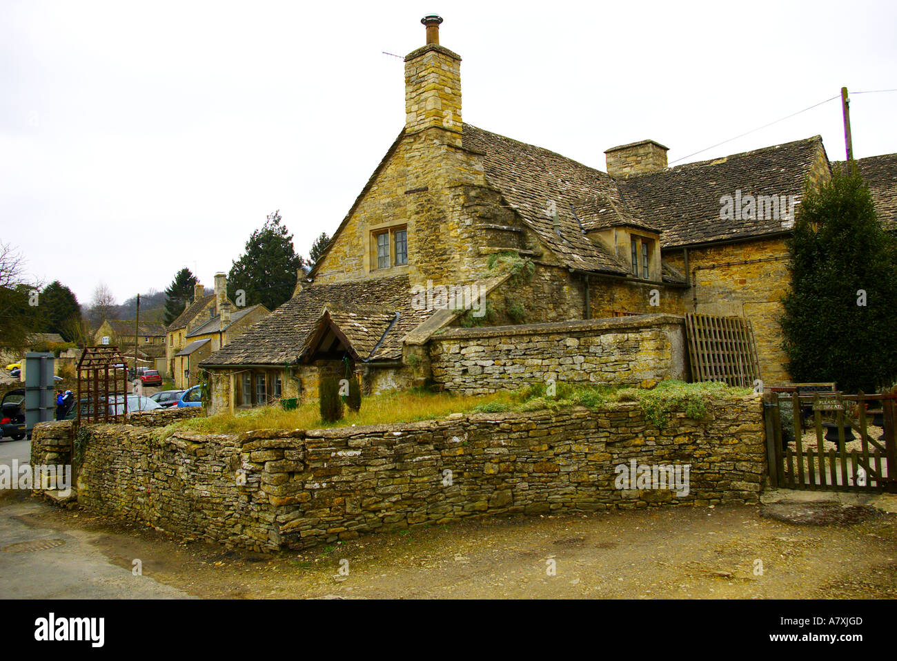 Tipico di cotswold di ciottoli casa di pietra in villaggio Foto Stock