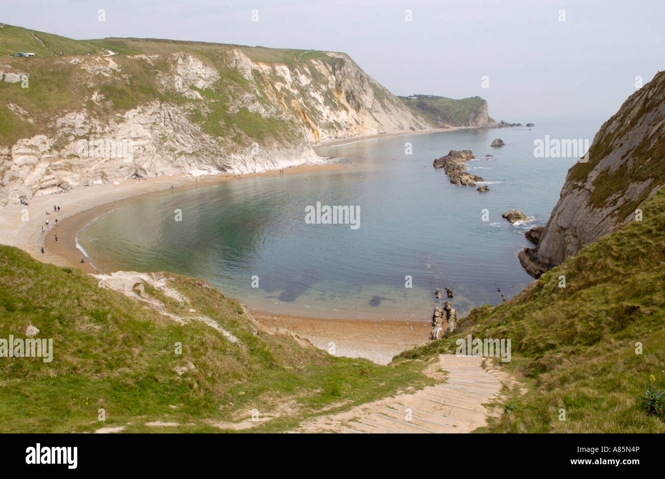St Oswald's Bay e uomo di guerra Dorset England Regno Unito Foto Stock