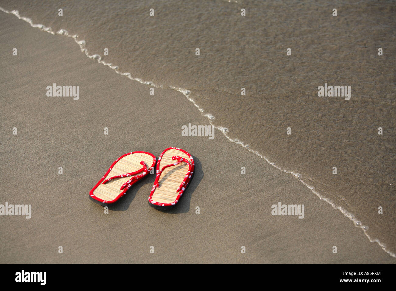 Sandali sulla spiaggia Foto Stock