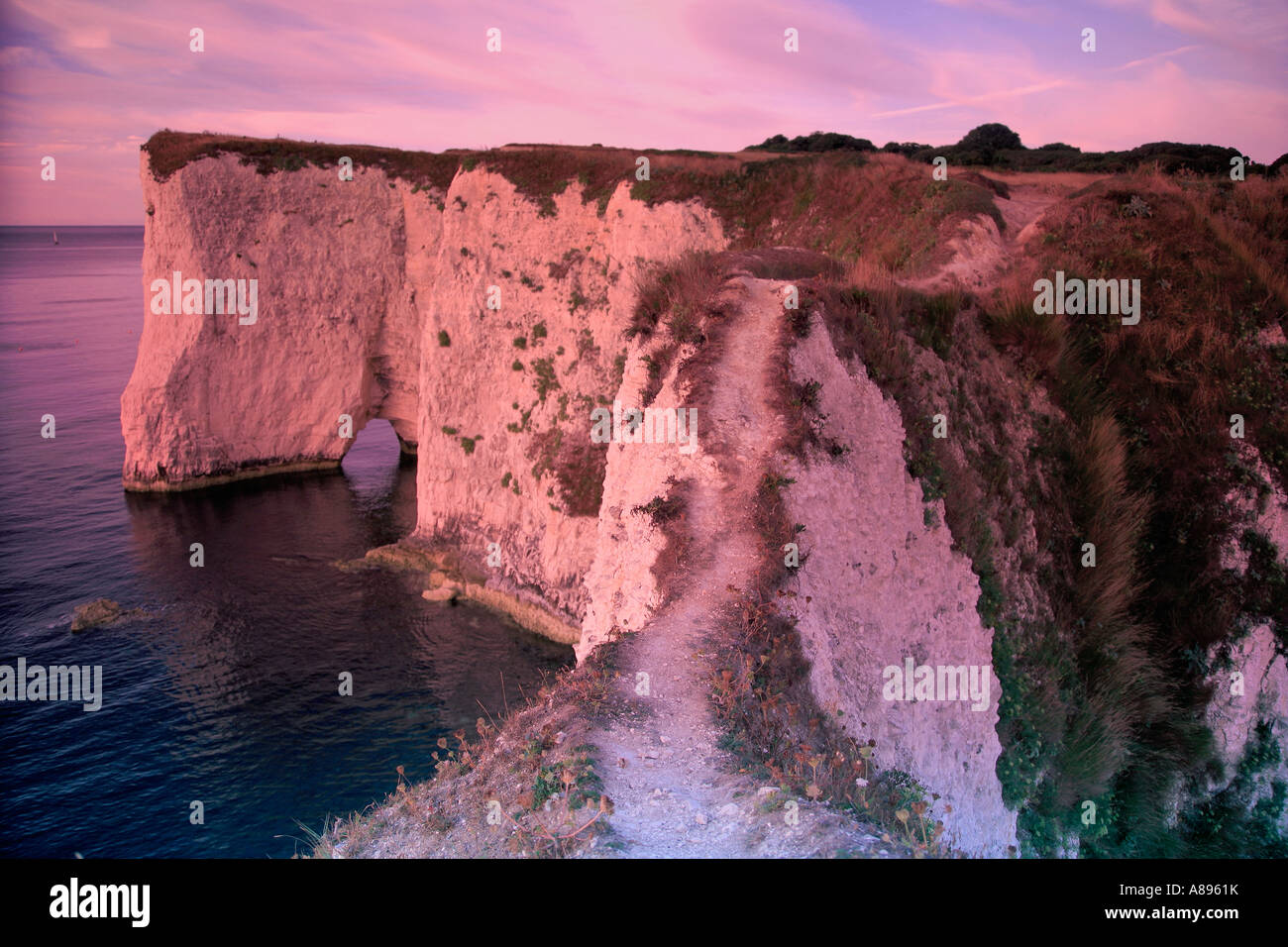 Alba Old Harry Rocks Poole Bay Jurassic la costa del Dorset in Inghilterra La Gran Bretagna REGNO UNITO Foto Stock