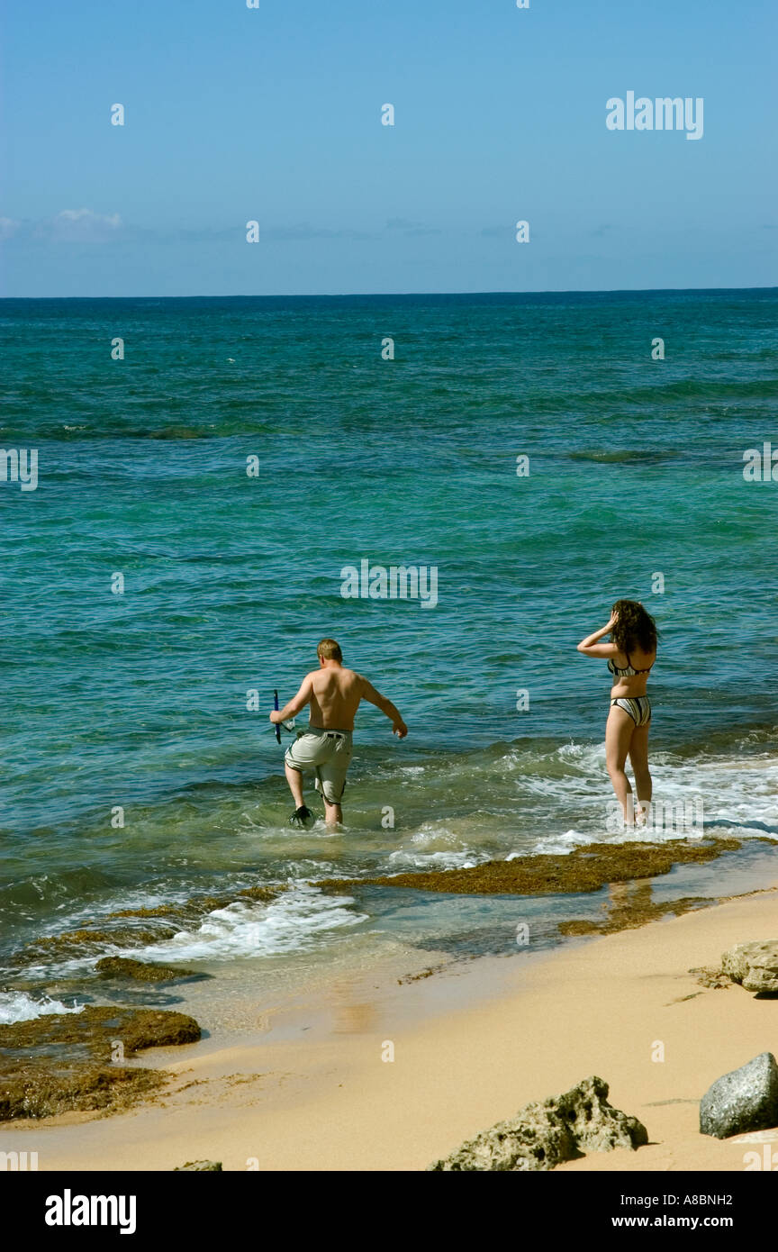 Hawaii Kauai giovane snorkeling a Lawai Beach sul lato sud dell isola Foto Stock