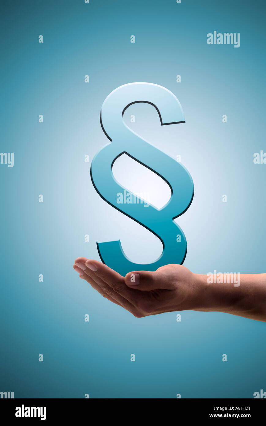 Il paragrafo segno Paragrafenzeichen in mano Foto Stock
