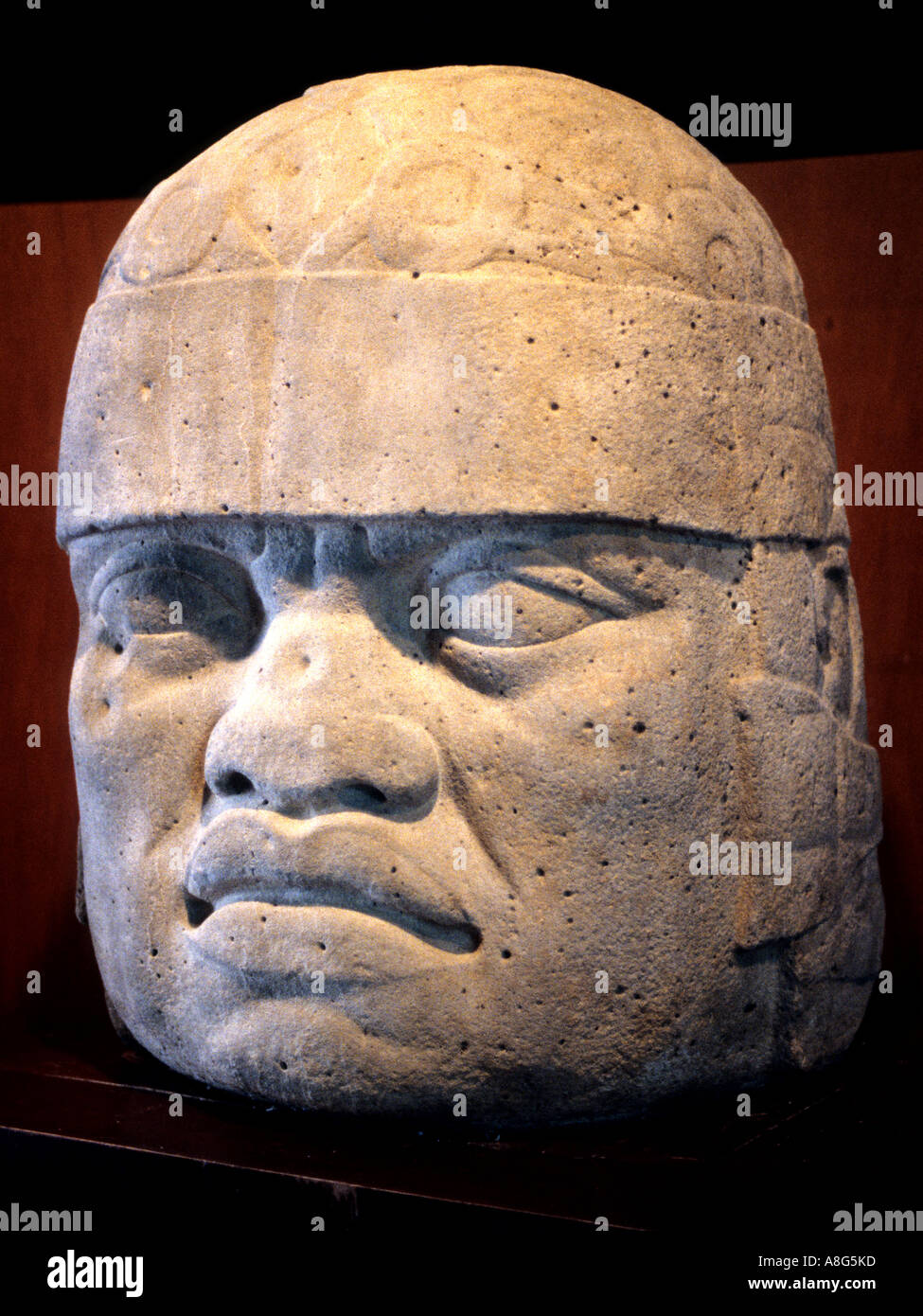 Scultura colossale testa Messico museo civiltà Maya Xipe Totec dio della molla Foto Stock