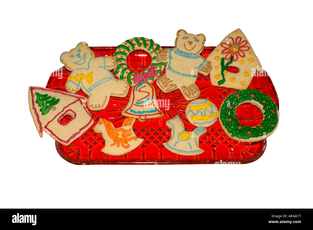 Decorate vacanze di Natale i cookie sul piatto rosso Foto Stock