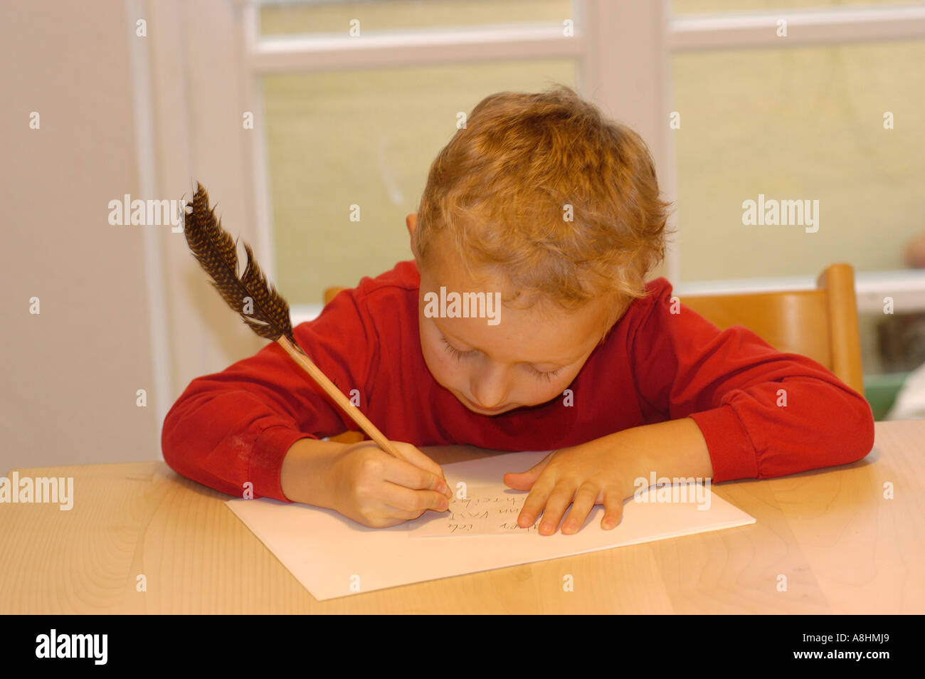 Cinque anni di vecchio ragazzo iscritto Foto Stock