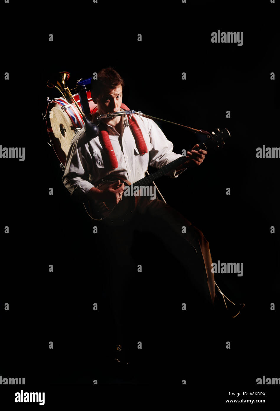 Un one man band Foto Stock