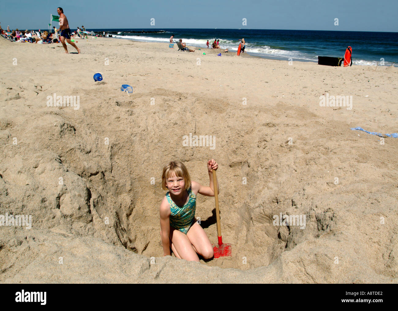 Scavare un foro in corrispondenza della NJ Shore Foto Stock