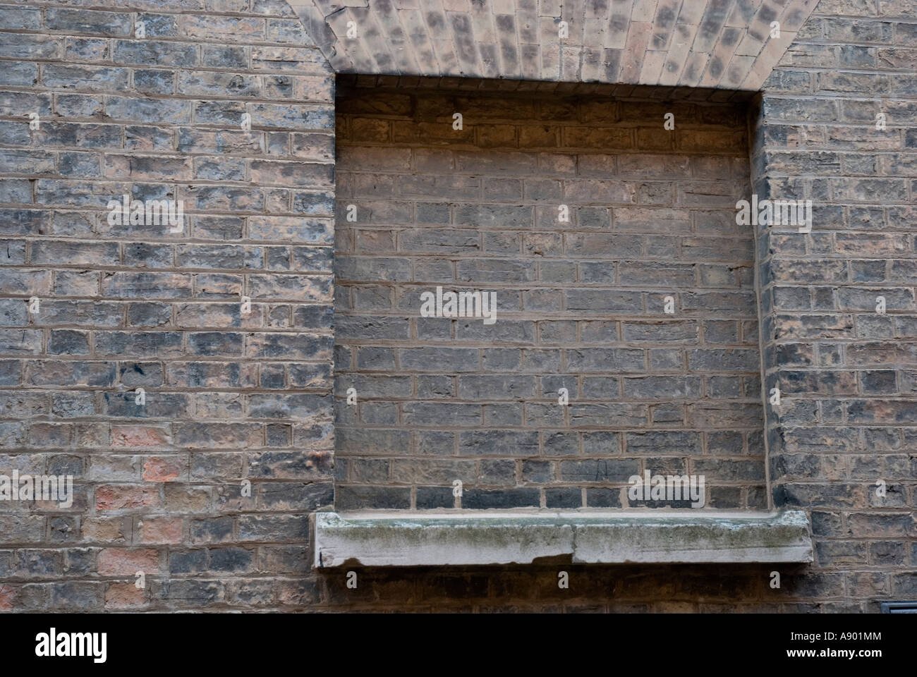 Murata finestra in Cambridge, Inghilterra Foto Stock