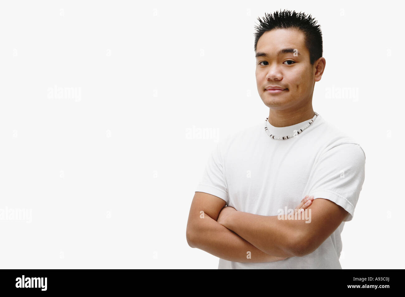 Ritratto di uomo asiatico con le braccia incrociate Foto Stock