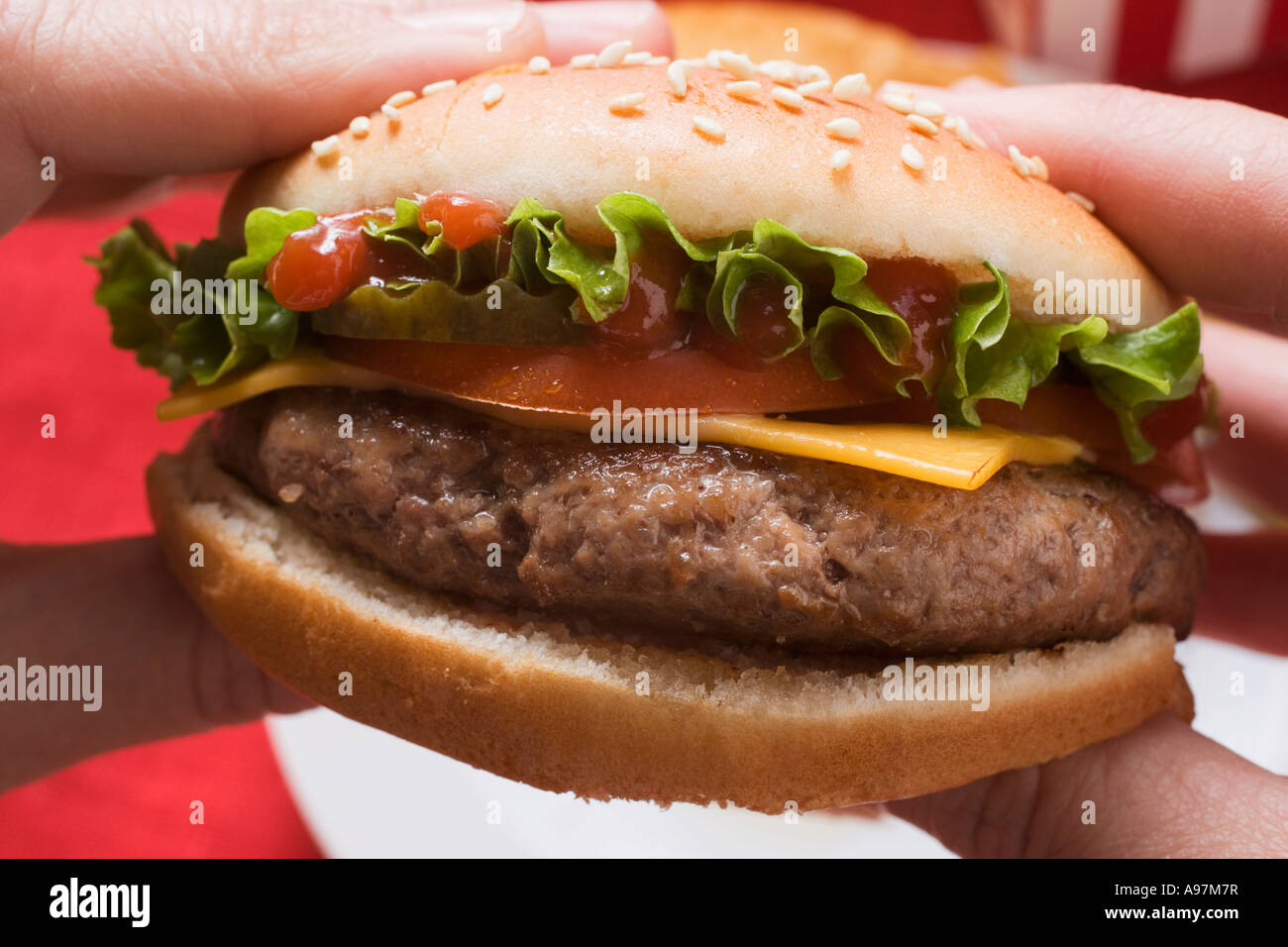 Mani cheeseburger FoodCollection Foto Stock