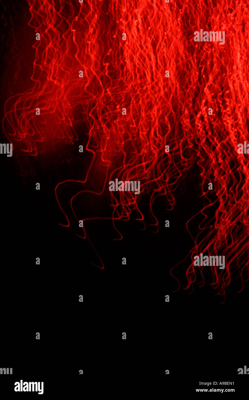 Sullo sfondo di un movimento rosso lampada delle fibre ottiche Foto Stock
