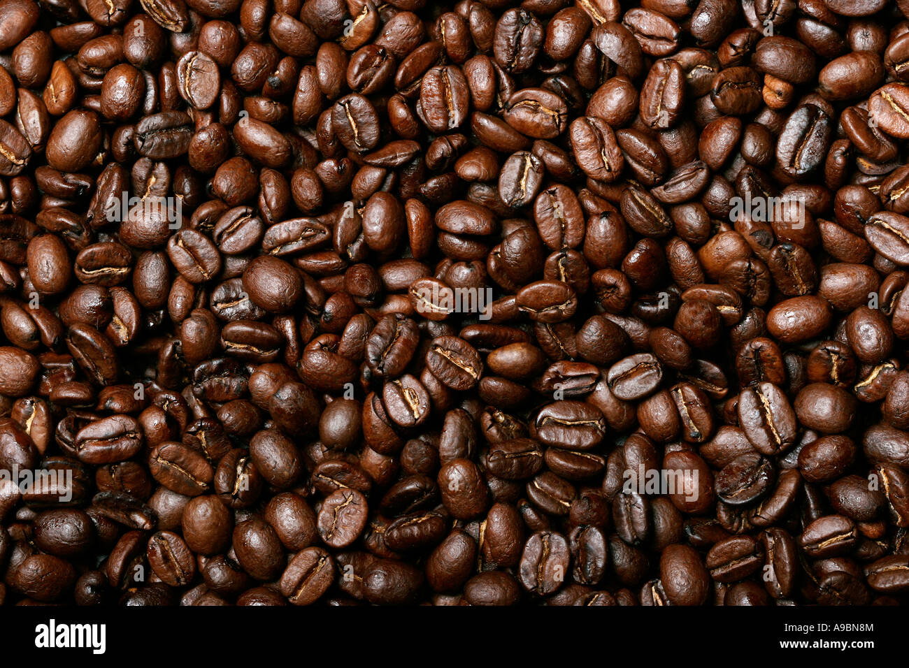 Sullo sfondo di un delizioso caffè tostato fagioli Foto Stock