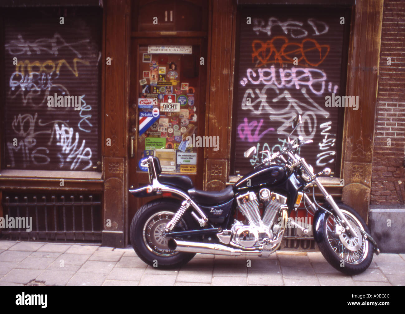 Moto parcheggiata Amsterdam Paesi Bassi Foto Stock