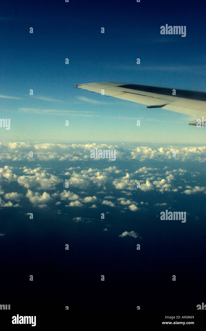 Una vista di cumulus cloud da passeggero aereo a getto Foto Stock